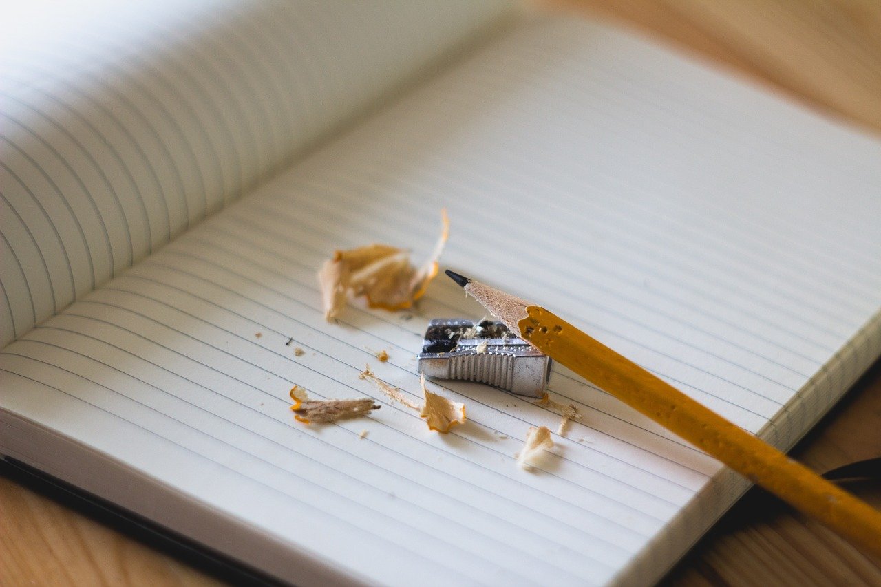 pencil sharpened over a pad